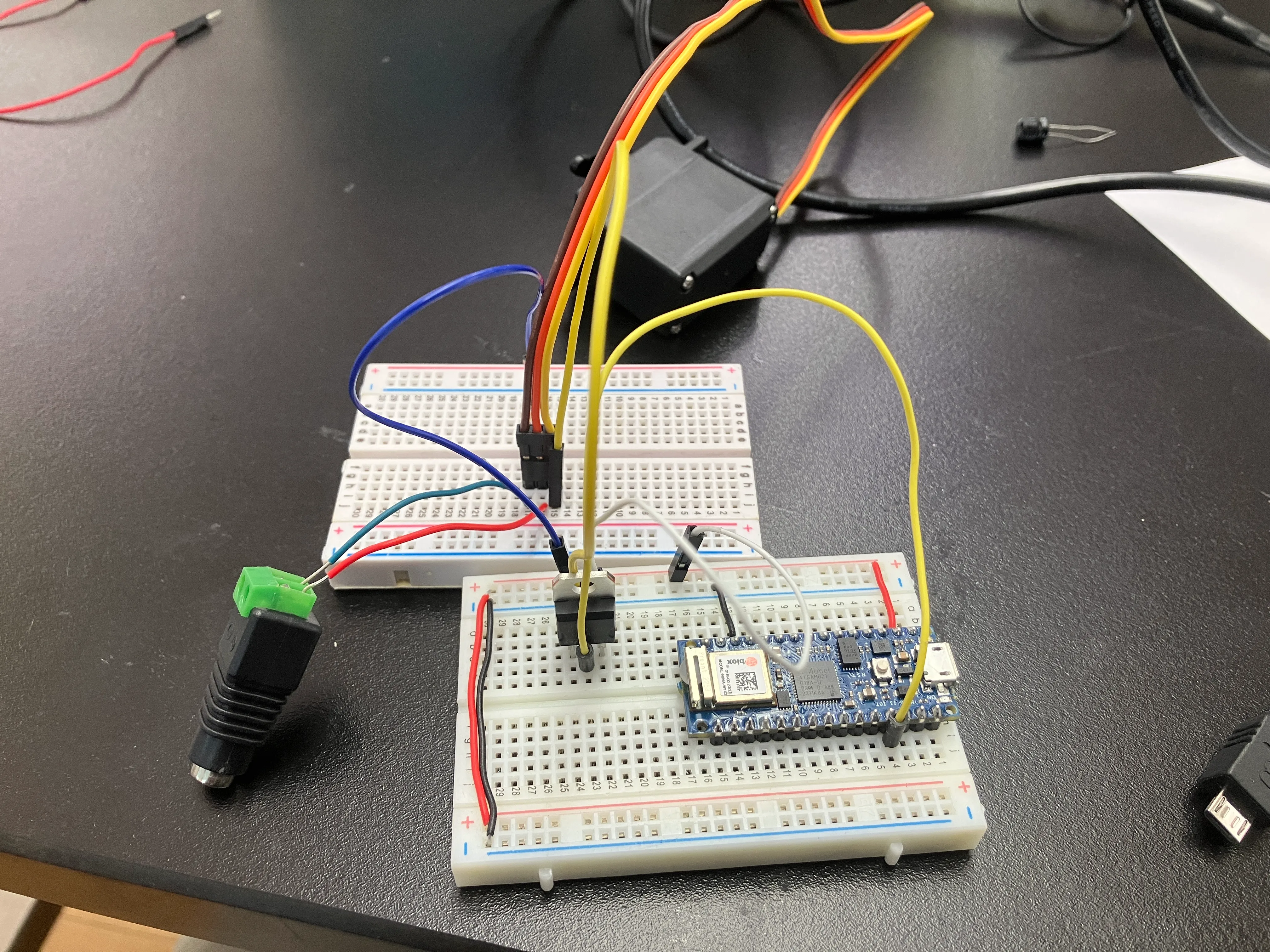 [z_images/IMG_6460..webp
this worked.
![[z_images/IMG_6461.webp
i then started to look at the oscilloscope.
this is the pulse my arduino sends via the digital output pin.
voltage through the circuit, without & with a capacitor.
another without:
even if nothing was plugged in, the voltage was still fluctuating exactly like when i last measured it, even if i clicked the ‘auto’ button. that was weird.
at this point, i only know how to see the pulse width modulation via an oscilloscope. i realised that the pulse width was too little. maybe that is what needs to be amplified via the transistor.
i then tried this. essentially, 3.3v (and whatever current) comes in through the arduino into the transistor. since digital-output sends less current, the transistor should amplify this current to the motor; thereby sending it more current to move.
![
