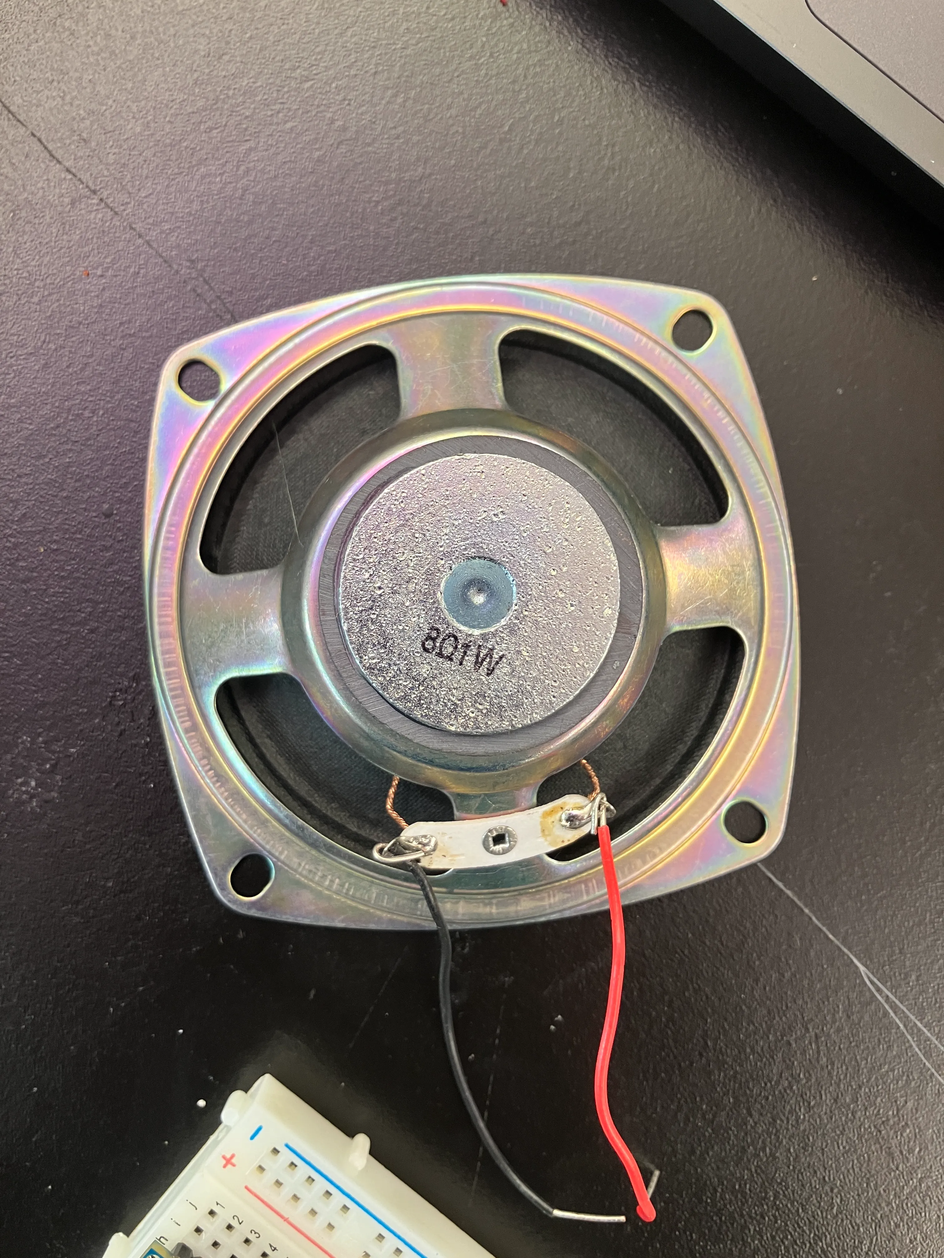 [z_images/IMG_6478.webp
to verify this, i plugged in another scope to measure the ‘in’ and ‘out’ via the transistor.
![[z_images/IMG_6479.webp
and, as expected, the voltage out from the transistor is much higher. why, then, does it not affect the servo motor?
![[z_images/IMG_6480.webp
why, then, does this not work?
but, i understood transistors a lot more in this week. i might come in tomorrow and work a bit on trying to make a beat-maker of sorts, with fsr-s as the interface.
quiz:
i looked at the quiz, but i don’t yet understand the point of it. last time when we filled it, it wasn’t discussed — so we might have gotten away with answers that weren’t right. at the moment, making things shows me more things than the quiz, and i understand concepts more clearly than assuming that my answer was right on a quiz.
tom had said that the quiz is meant to help us understand if we know what’s happening. but, via a quiz, i can’t visualise what’s happening (or supposed to happen). i’ll just make a list of things that i didn’t understand, and ask tom later.
i understood everything, except this:
Two resistors in series create a voltage divider. When one of the resistors is a variable resistor, they can be used to create an analog input to a microcontroller. Draw and upload the schematic for this circuit (PNG or JPG only).
i was also confused about this:
Imagine you used analogRead() to read an analog input. You got a reading of 10. Assume an analog input voltage range from 0 to 5 V. What is the voltage of your reading?
my answer:
map? 
function mapRange(value, inMin, inMax, outMin, outMax) {
  return ((value - inMin) * (outMax - outMin)) / (inMax - inMin) + outMin;
}
function calc() {
  var val = mapRange(10, 0, 1023, 0, 5);
  console.log(val);
}
calc();
0.04v?
making a beat-looper:
how do i know how much current can something take? for example, the speaker:
![